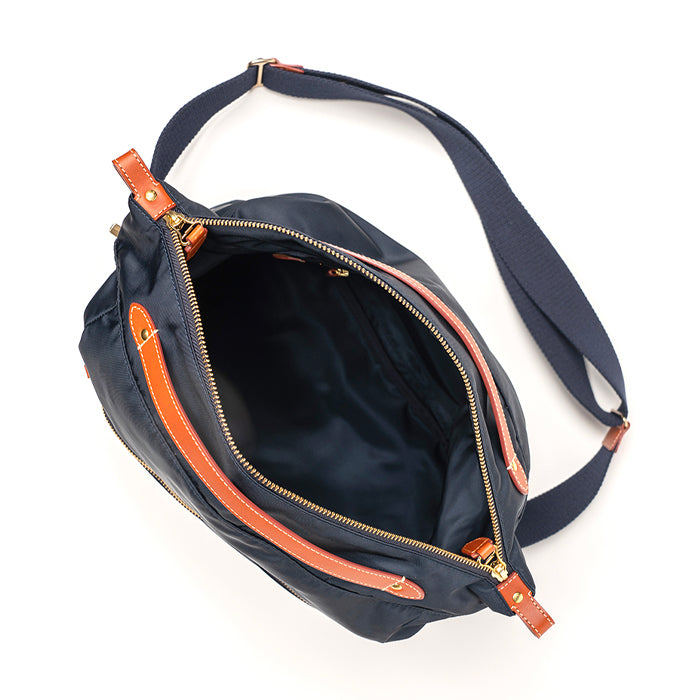 Mei-di-Felisi-borsa-a-mano-e-tracolla-donna-realizzata-in-nylon-tecnico-blu-con-finiture-in-pelle-di-vacchetta-chiaro-con-minuteria-metallica-ottone-interno-foderato-in-nylon-blu