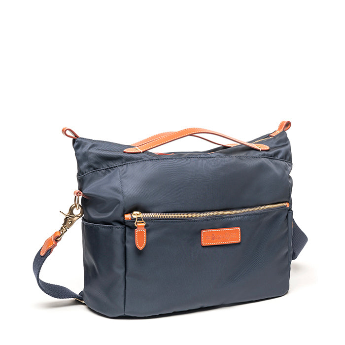 Mei-di-Felisi-borsa-a-mano-e-tracolla-donna-realizzata-in-nylon-tecnico-blu-con-finiture-in-pelle-di-vacchetta-chiaro-con-minuteria-metallica-ottone