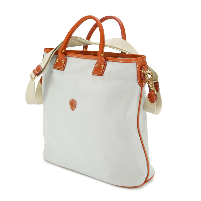Nemo-borsa-a-mano-e-tracolla-in-canvas-di-cotone-grigio-chiaro-con-finiture-in-pelle-di-vacchetta-chiaro-e-tracolla-in-tela